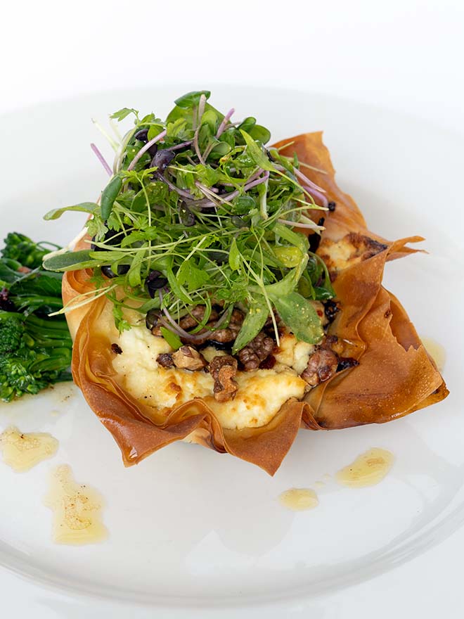 Vegetarian options open filo tarte with goats cheese walnuts fig jam and microherbs