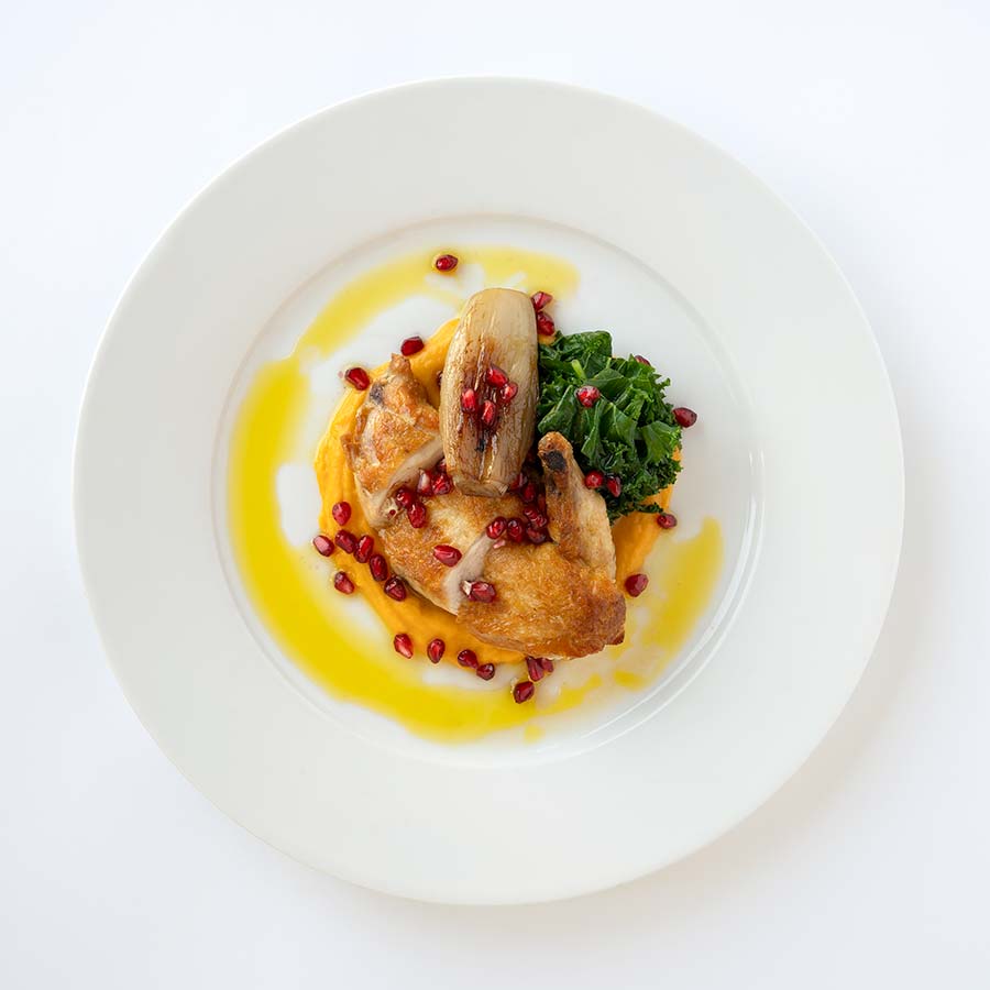 chicken breast with caramelised shalotts greens and pomegranite checken breast with caramelised shalotts greens and pomegranite