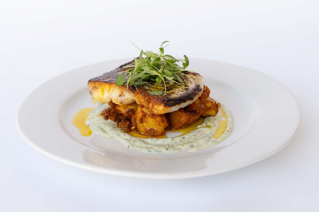 pan fried hake with spiced potatoes and herb yoghurt cod with spiced potatoes and herb yoghurt