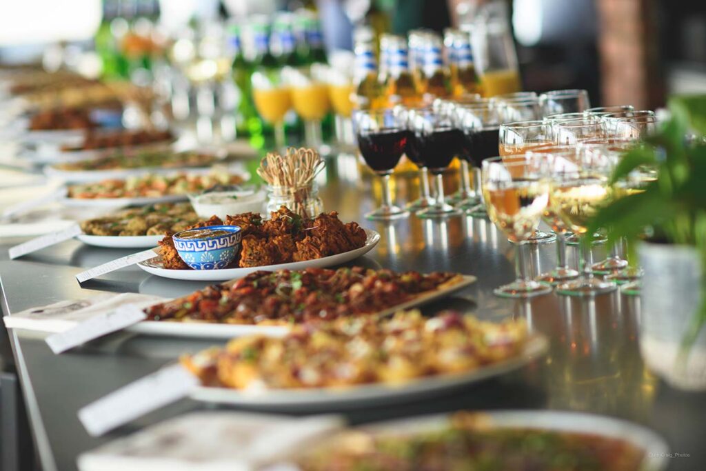 large table laid with delicious food for business event in bristol large table laid with delicious food for business event in bristol