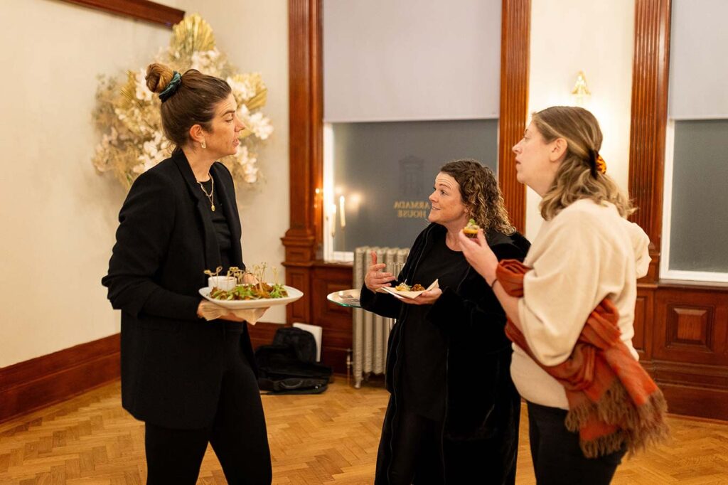 staff from kate’s kitchen serving canapes at corporate event staff from kate's kitchen serving canapes at corporate event
