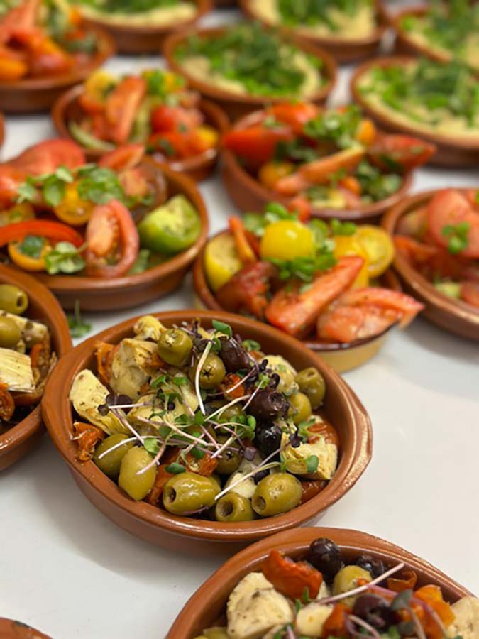 mixed anti pasti in terracotta bowls for wedding tables mixed anti pasti in terracotta bowls for wedding tables