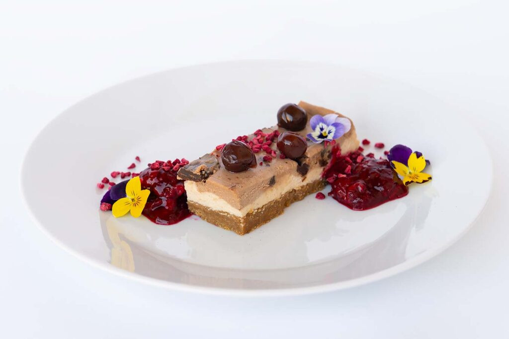 chocolate cheese layer cake with fruit compot