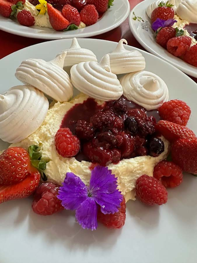 mini meringues with clotted cream, summer berries and compote