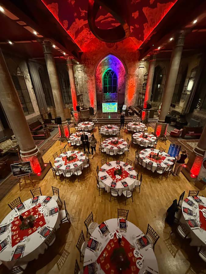 tables laid at circomedia for wedding reception
