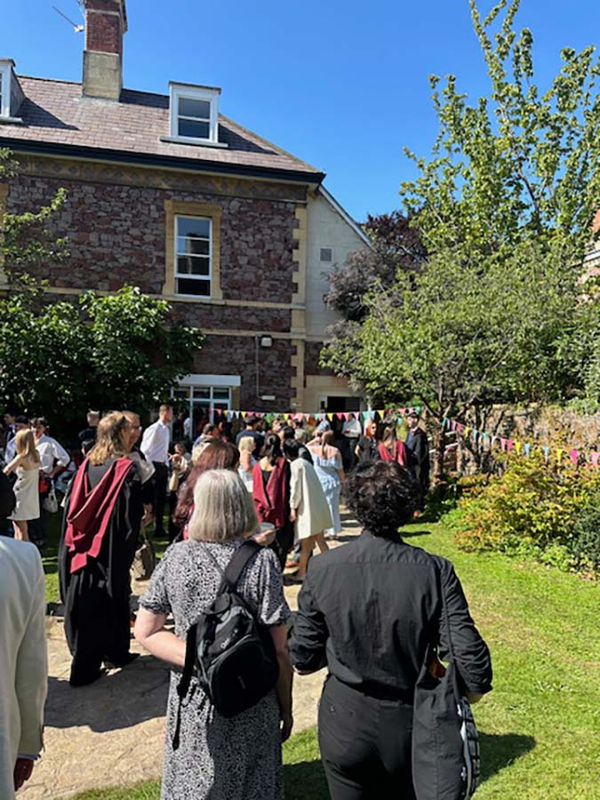 wedding guests gather in the garden for canapes wedding guests gather in the garden for canapes