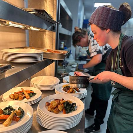 kate's kitchen chefs plating up food for wedding in bristol